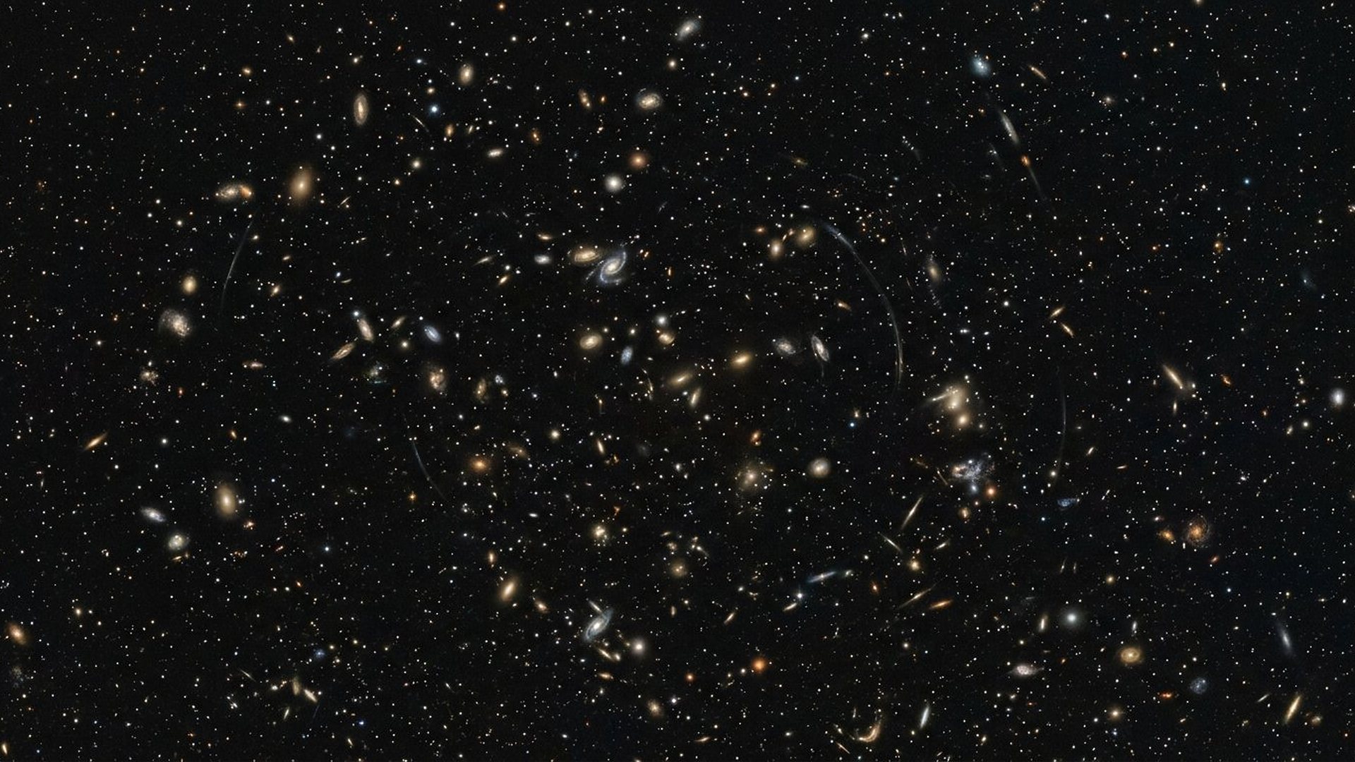 Champ profond parsemé de galaxies lointaines.